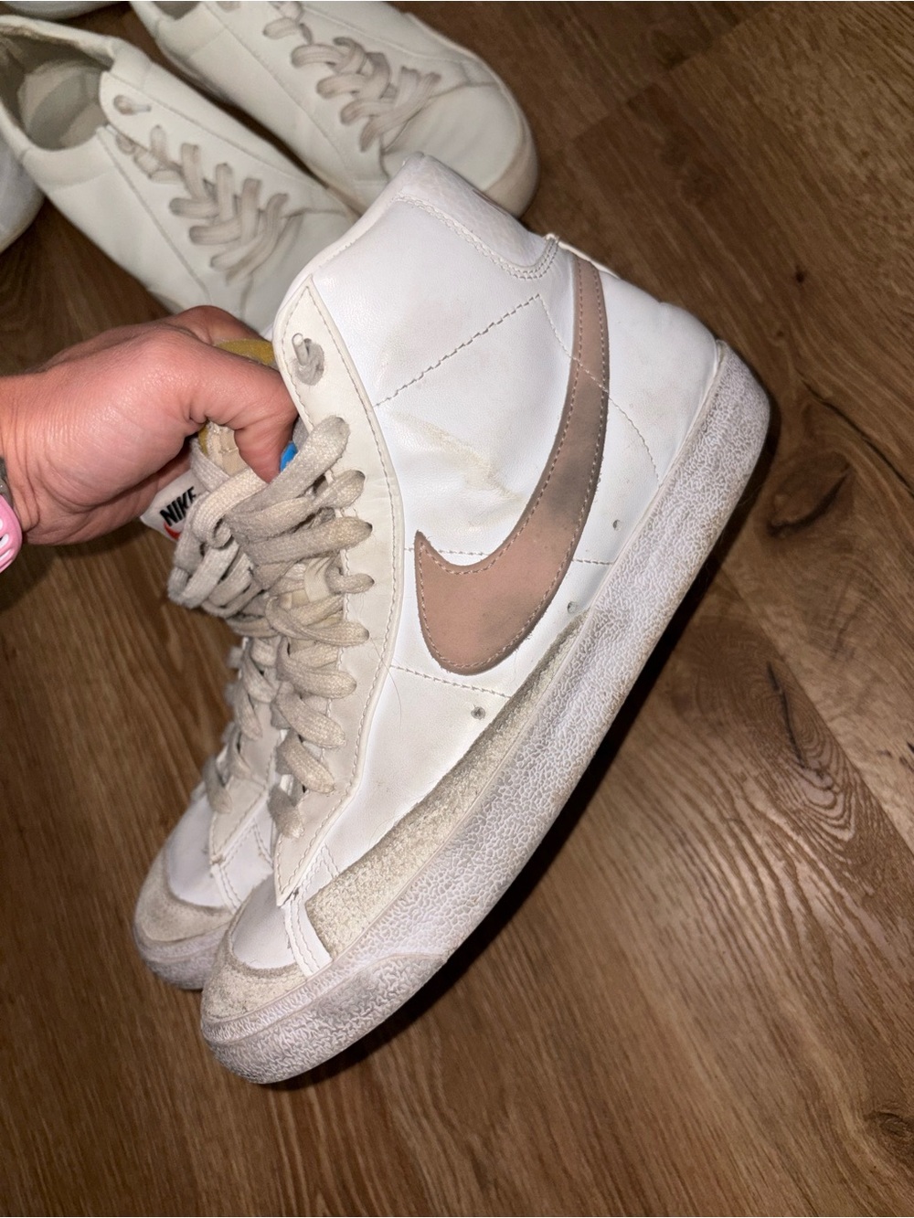 Nike Women's White High-Top Sneakers with Light Pink Swoosh